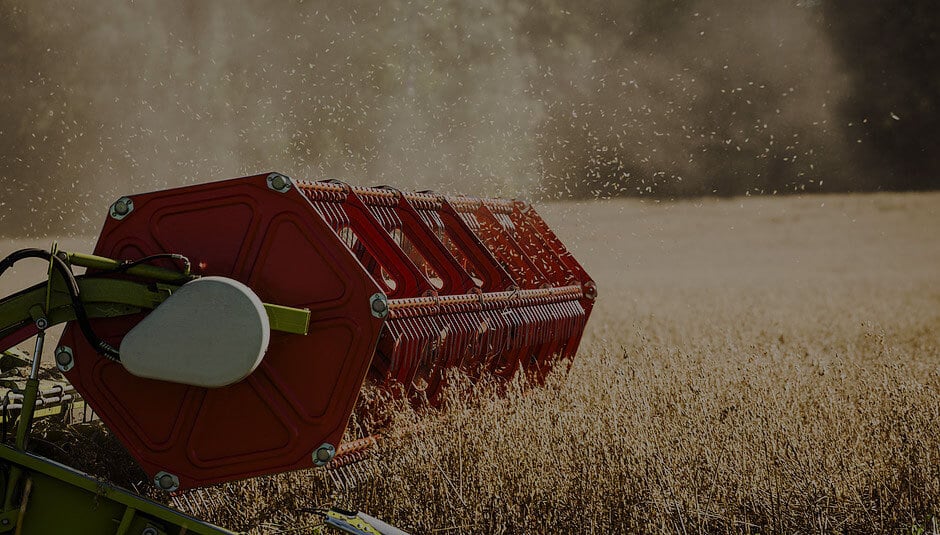 Combine Harvester on Field